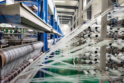 The weaving workshop machinery of a certain packaging factory is running, producing new fiber ropes and fiber bags
