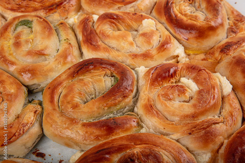 Spinach pastry. Spanakopita, greek phyllo pastry pie with spinach and feta cheese filling. Spinach Tart or Spinach Pie. Spinach pastry. Spanakopita, greek phyllo pastry pie with spinach and feta cheese filling. Spinach Tart or Spinach Pie.