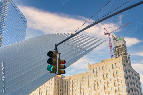 Stunning cityscape showcasing towering modern skyscrapers and urban architecture against a sky. The sleek glass facades reflect the vibrant surroundings, creating a striking visual contras