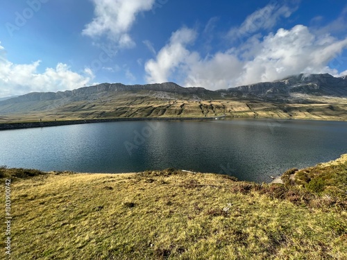 The alpine lake Tannensee or Tannen Lake in the Uri Alps mountain massif, Kerns - Canton of Obwalden, Switzerland (Kanton Obwald, Schweiz) photo