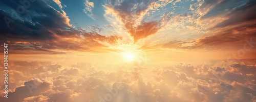 Vibrant sunrise illuminating clouds in a colorful sky.