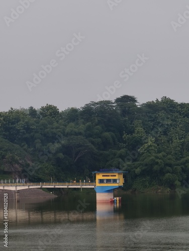 The beauty of Cacaban Reservoir, a reservoir and natural and boat tourism destination in Tegal Regency, Central Java. This reservoir is located in Penujah Village, Kedung Banteng District. photo