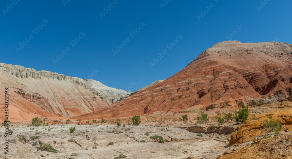 Picturesque clay mountains under dramatic skies in Altyn Emel National Park in southeastern Kazakhstan Picturesque clay mountains under dramatic skies in Altyn Emel National Park in southeastern Kazakhstan