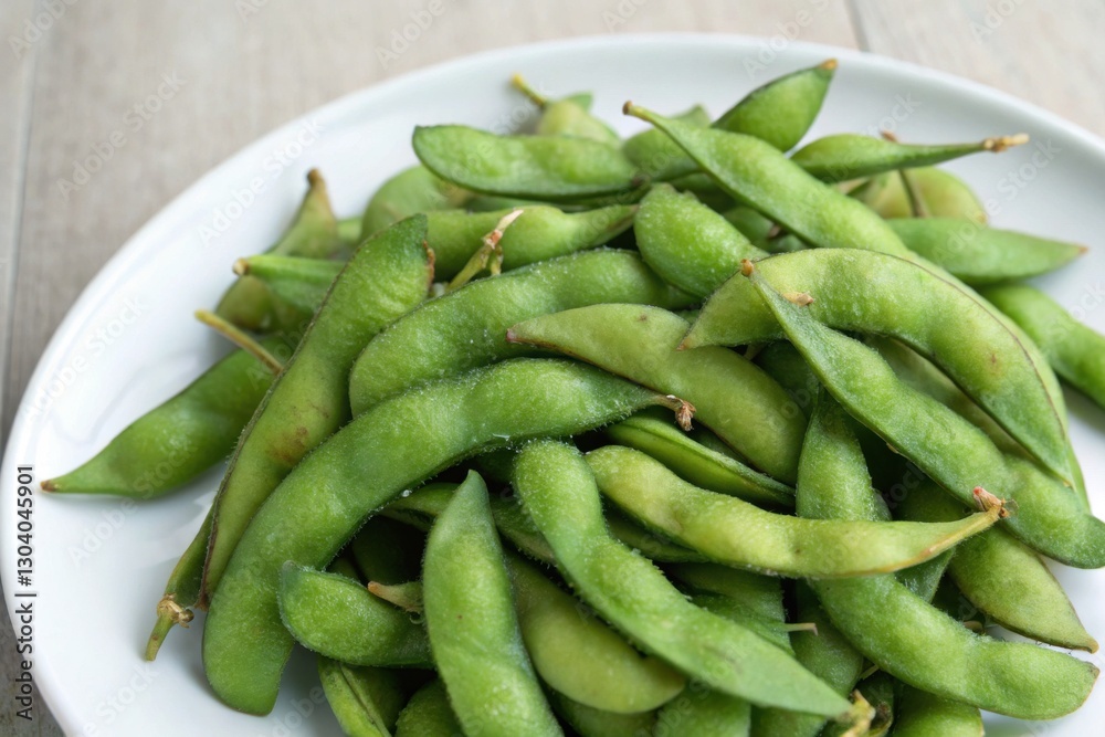 Fresh Edamame Beans on a Plate - Perfect for Healthy Snacking or Cooking Fresh Edamame Beans on a Plate - Perfect for Healthy Snacking or Cooking