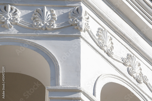 Renovated old building reflects elegance with stunning white stucco cornice