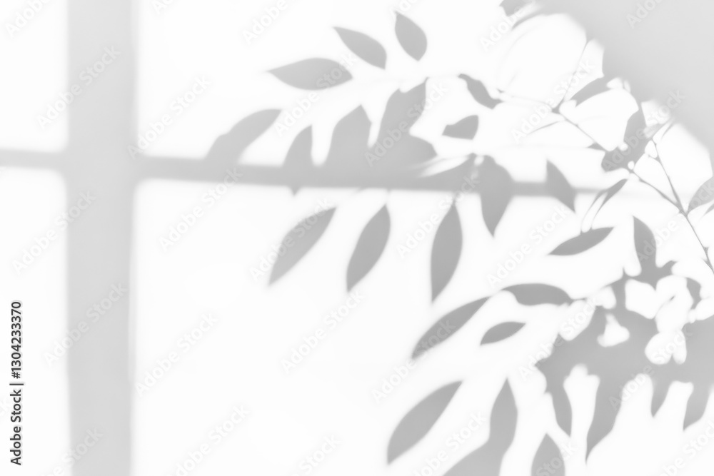 Soft shadows of leaves create calming pattern on smooth, dark surface, evoking sense of tranquility and nature gentle touch Soft shadows of leaves create calming pattern on smooth, dark surface, evoking sense of tranquility and nature gentle touch