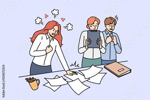 Angry woman manager shouts at frightened employees because of mistake or chaos in documents. Aggressive girl director with unbalanced psyche is angry at clerks who have not completed task