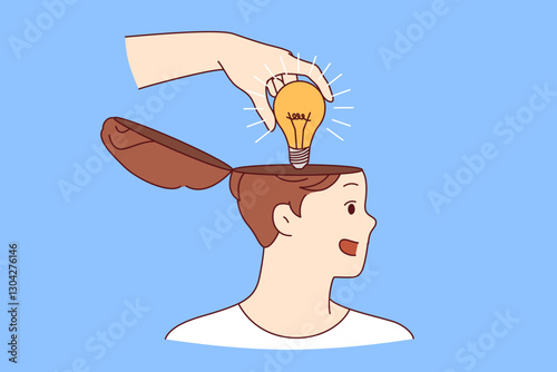 Mentor hand puts idea in shape of light bulb into man head, symbolizing training and valuable advice that causes personal development. Teacher giving idea to student during proper educational process