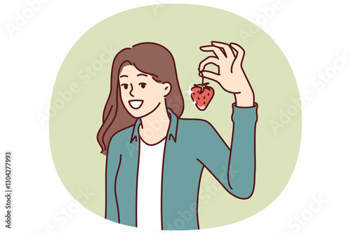 Woman with strawberries smiles recommending eating fresh organic fruits containing healthy vitamins. Large strawberry in hand of beautiful girl showing off good harvest of berries.