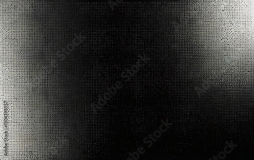 A dark, grainy texture with a blend of black and gray tones. Ideal for moody backgrounds or overlays. Could represent metal, concrete, or a worn surface. Use in graphic design or digital art.
