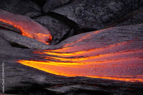 Hot magma flows  over old lava field