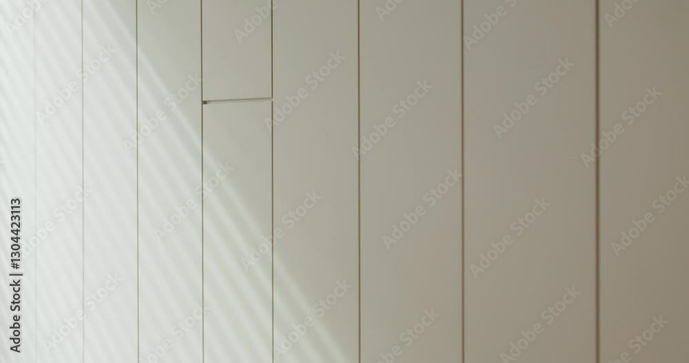 Simple and clean white wooden panels bathed in soft sunlight, creating gentle shadows. Ideal background for design and decor themes. Minimalist White Wooden Panels with Soft Light Shadows Simple and clean white wooden panels bathed in soft sunlight, creating gentle shadows. Ideal background for design and decor themes. Minimalist White Wooden Panels with Soft Light Shadows