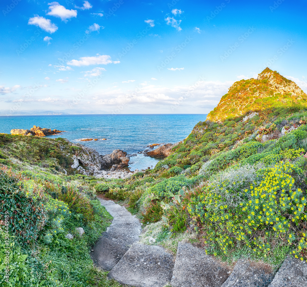 Amazing spring view on the the cape Milazzo panorama of nature reserve Piscina di Venere.