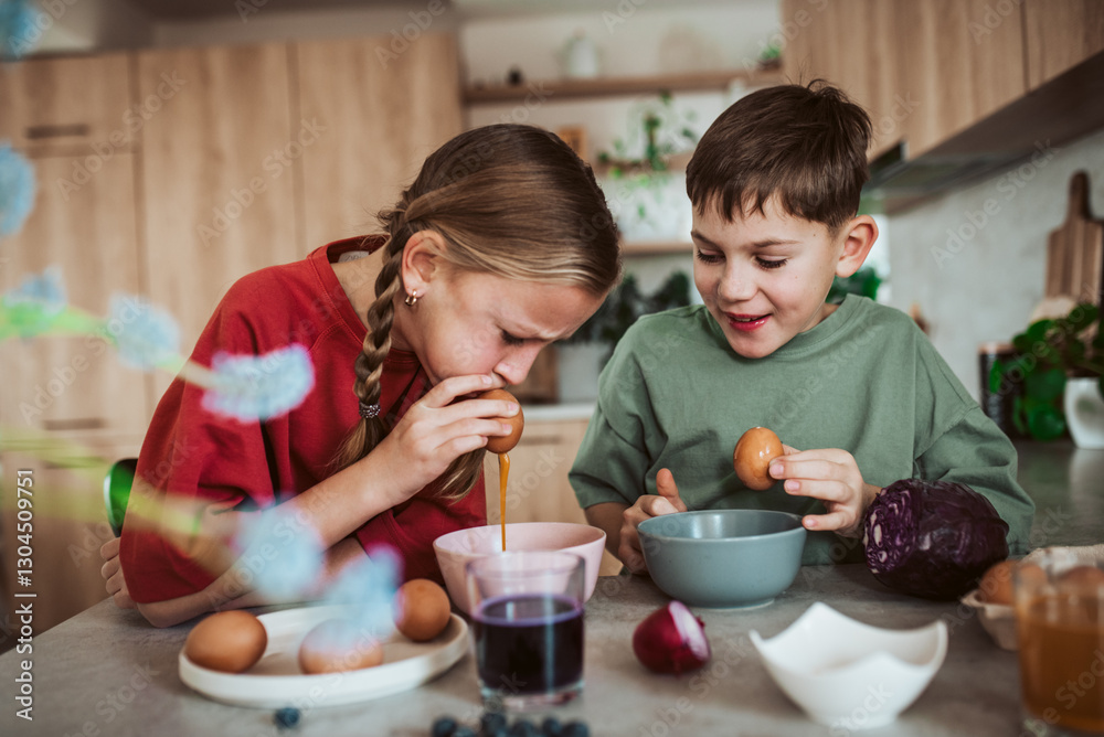 Siblings preparing egshells for easter egg decorating. Siblings preparing egshells for easter egg decorating.