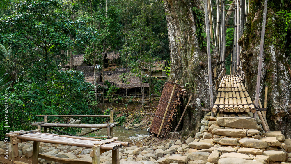 The bamboo bridge or known as the Gajeboh Bridge is made of natural materials from nature. This bridge is located in Gajeboh Village, Outer Baduy Tribe, Banten, Indonesia. The bamboo bridge or known as the Gajeboh Bridge is made of natural materials from nature. This bridge is located in Gajeboh Village, Outer Baduy Tribe, Banten, Indonesia.