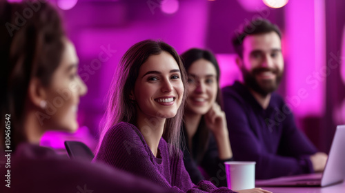 Smiling young professionals in a collaborative team setting