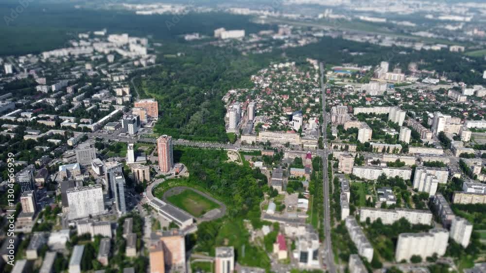 Aerial green Kharkiv city residential district with streets, parks and houses with miniature blur effect Aerial green Kharkiv city residential district with streets, parks and houses with miniature blur effect