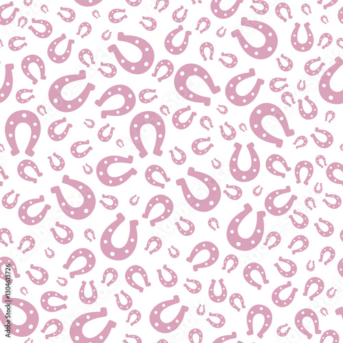 Pink silhouette of lucky horseshoe. Seamless vector pattern. Endless ornament. Isolated colorless background. Horse shoes in glamorous pink color. St. Patricks Day. Flat style. Repeating symbol.