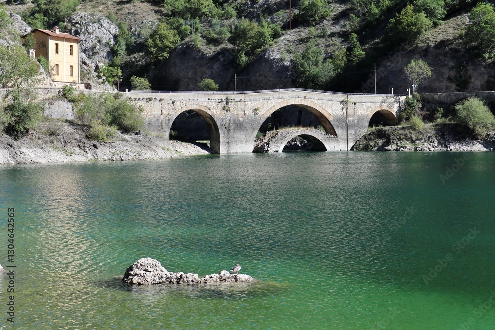 Villalago - Ponte sul lago di San Domenico dalla riva