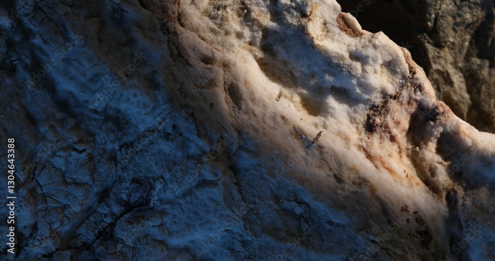 Rock Surface with Blue Shadows and Warm Light Contrast Rock Surface with Blue Shadows and Warm Light Contrast