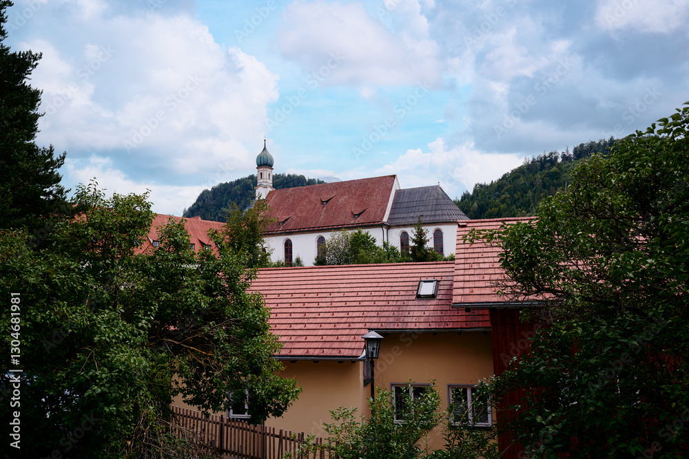 Charming European Village With Scenic Rooftops and a Church Spire.. Charming European Village With Scenic Rooftops and a Church Spire..