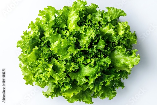  Green lettuce salad arranged in top view on white background. Fresh food photography for vegan menus, diet plans, or restaurant advertisements