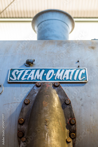 Steam-o-matic sign on a train photo