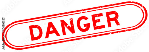 Grunge red danger word rubber seal stamp on white background
