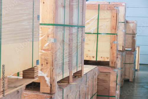 Plywood packaging on pallets in polyethylene film