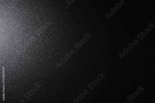 Dark Shimmering Texture with Subtle Sparkle on a Black Surface