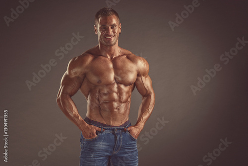 Muscular young man with naked torso