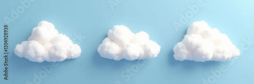 Fluffy White Clouds on Light Blue Background
