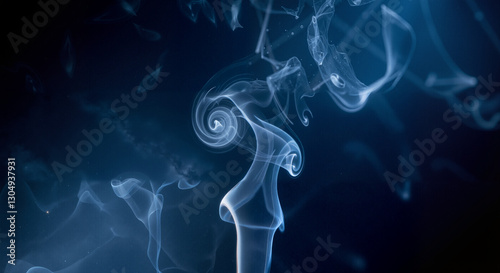 Dynamic Blue Smoke Swirls Against Black Backdrop