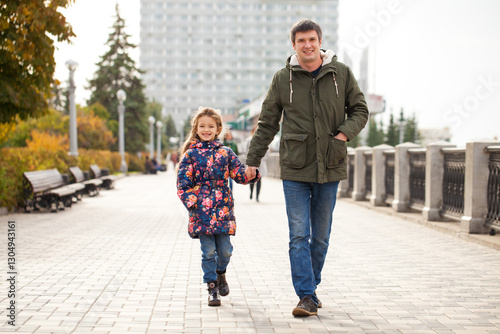 Wallpaper Mural Father and little daughter in autumn park Torontodigital.ca