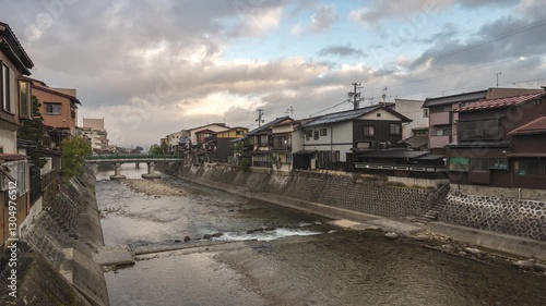 Takayama Gifu Japan time lapse city skyline at Miyagawa river and old town in autumn season photo