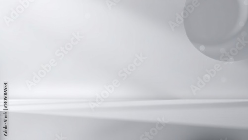 Empty gray room with light shadows
