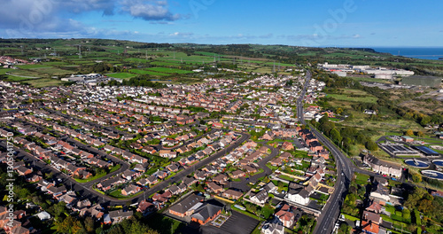 Aerial view of Residential homes town houses in Eden and Carrickfergus Town Co Antrim Northern Ireland