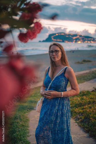 Woman on the beach at the s...