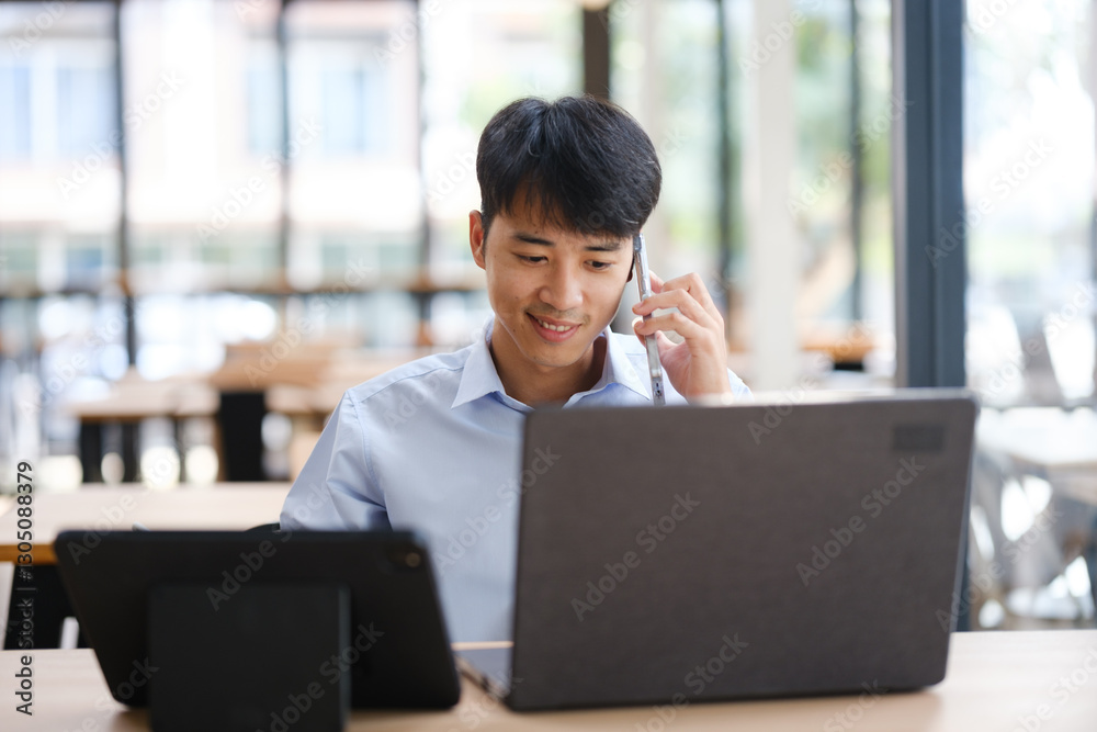 Business consultant discussing financial strategies on a phone call Business consultant discussing financial strategies on a phone call