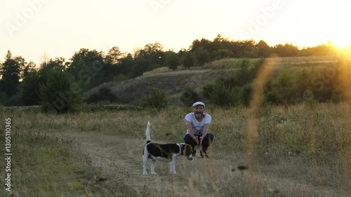 Man Running with Dog in Nature at Sunset