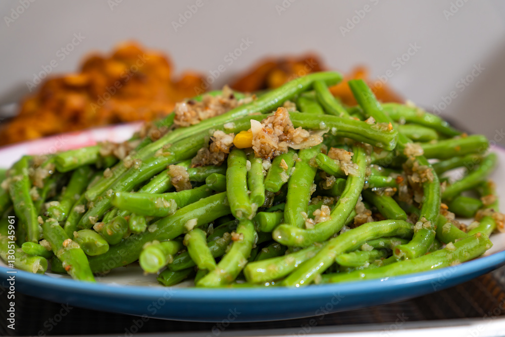 plate of stir fried green beans with garlic plate of stir fried green beans with garlic