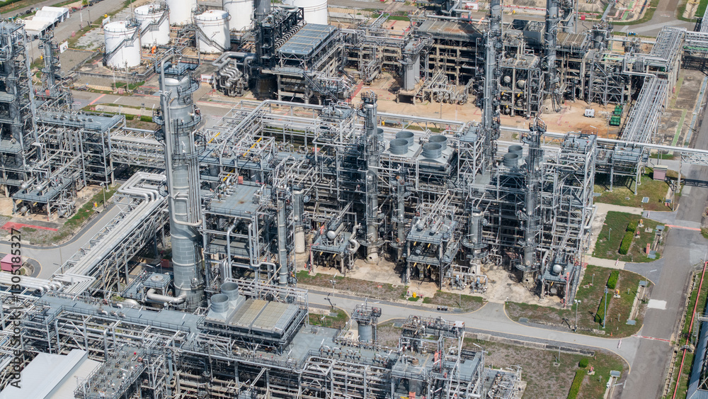 Obraz premium Aerial view Industry Oil refinery oil and gas refinery background, Business petrochemical industrial, Refinery oil and gas factory power and fuel energy, Ecosystem estates. Fuel refinery industry 
