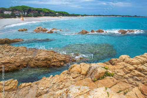 Fototapeta Naklejka Na Ścianę i Meble -  beautiful water transparent and blue of a sea in a Sardinia beach with granite rock
