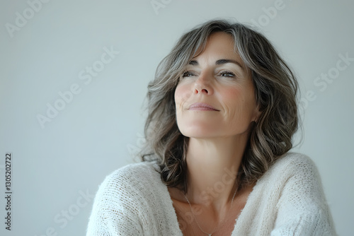 Happy Mature woman portrait with short grey hair isolated on white background