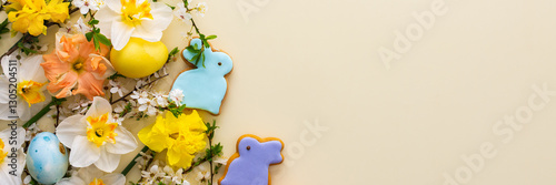 Fotografie Festive banner with spring flowers and naturally colored eggs and Easter bunnies