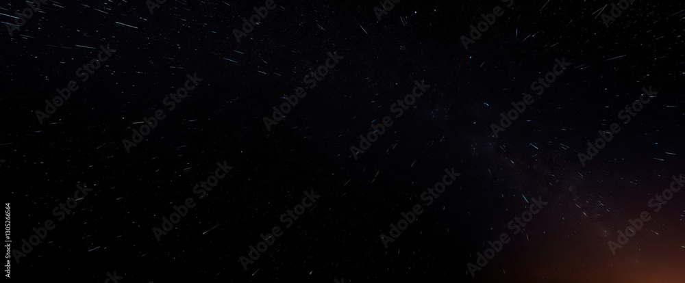 Fototapeta premium mesmerizing canvas of celestial wonder where distant stars paint streaks across night sky in timeless beauty