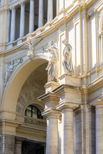 Galleria Umberto I showing caryatids, columns, and arch in Naples, Italy