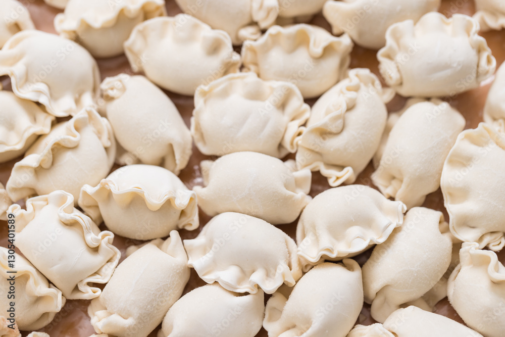 Raw Chinese meat dumplings perfect for steaming