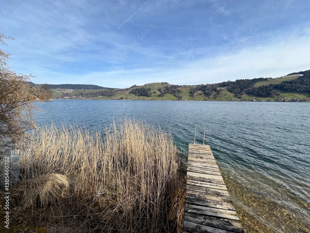 Fototapeta premium Swiss subalpine lake See Ägerisee or Ageri Lake (Ägeri Lake or Aegeri Lake) - Canton of Zug, Switzerland - (Agerisee oder Aegerisee - Kanton Zug, Schweiz)