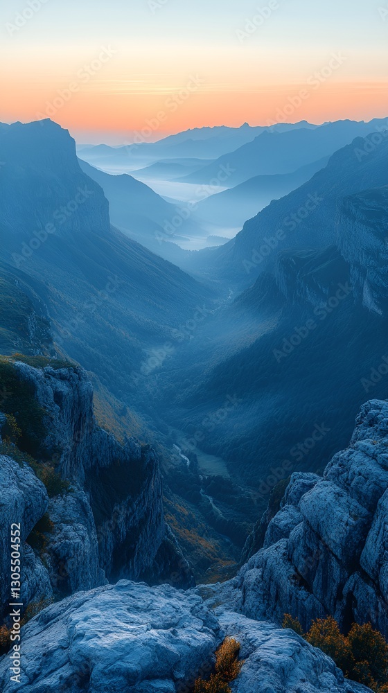 Fototapeta premium Inspirational Mountain Range Under Soft Morning Light with Motivational Quote Overlay